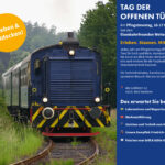 Historischer Zug der Eisenbahnfreunde Wetterau fährt durch grüne Landschaft – Einladung zum Tag der offenen Tür am Pfingstmontag mit buntem Programm
